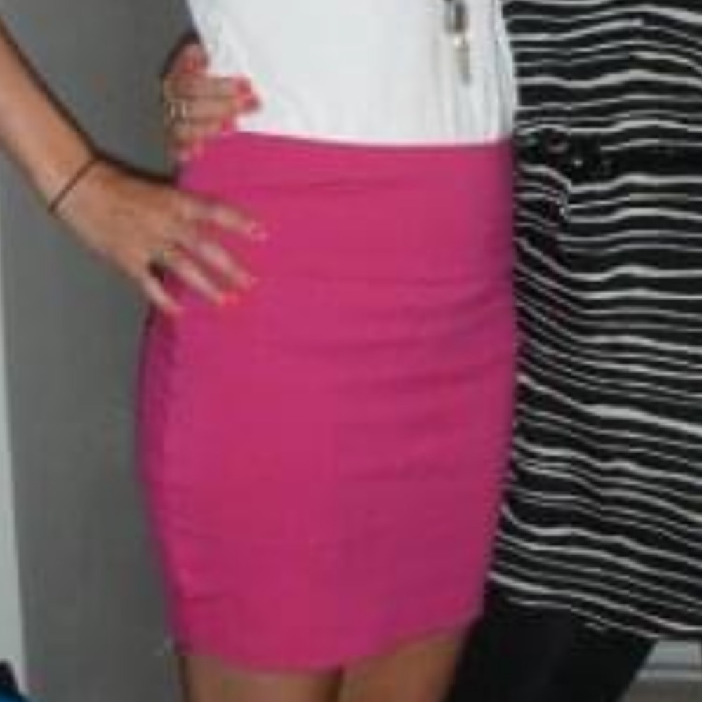 Two small mini bondage skirts, black and pink.